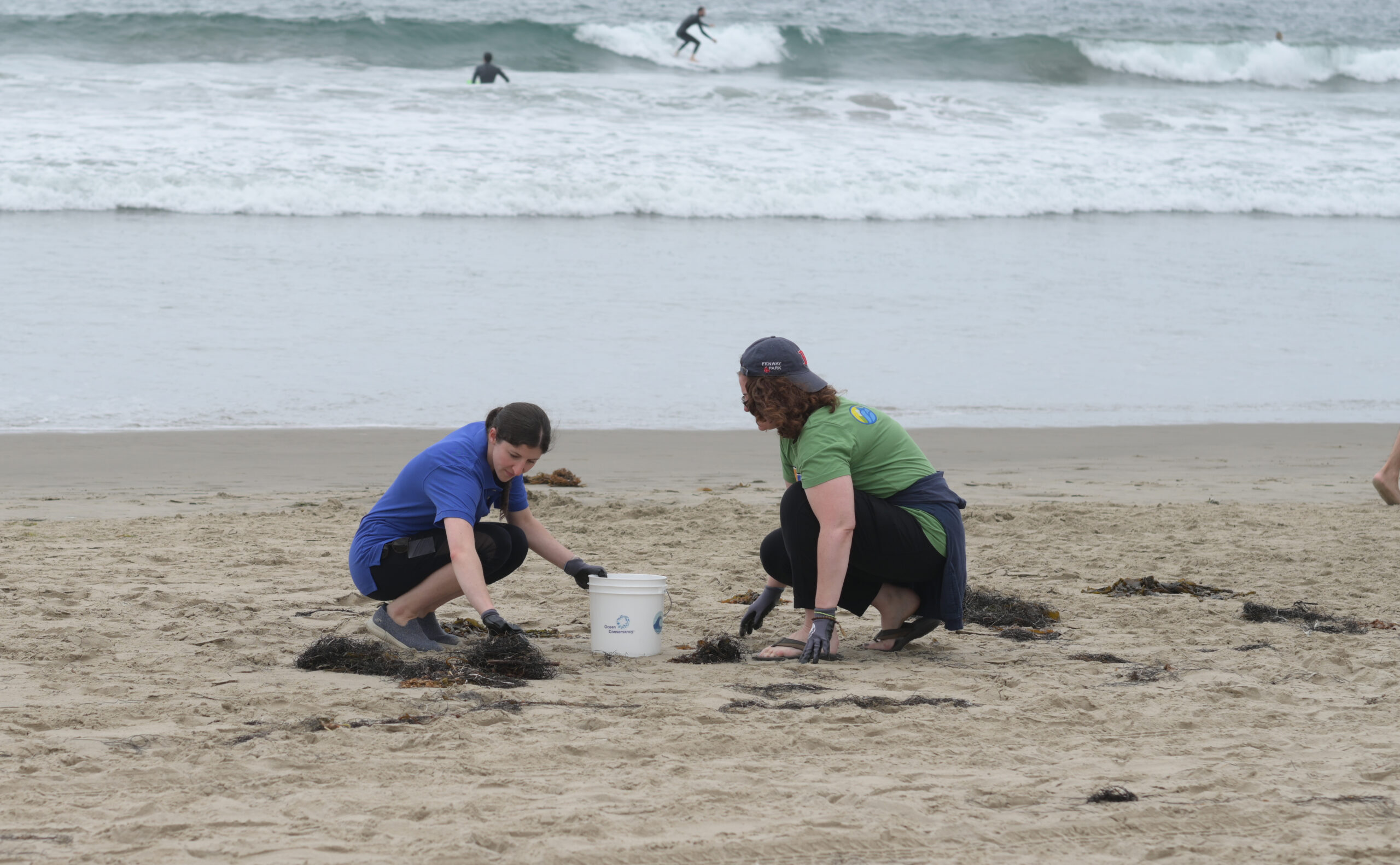 Volunteers participate in 2022 International Coastal Cleanup event in Santa Monica, California.